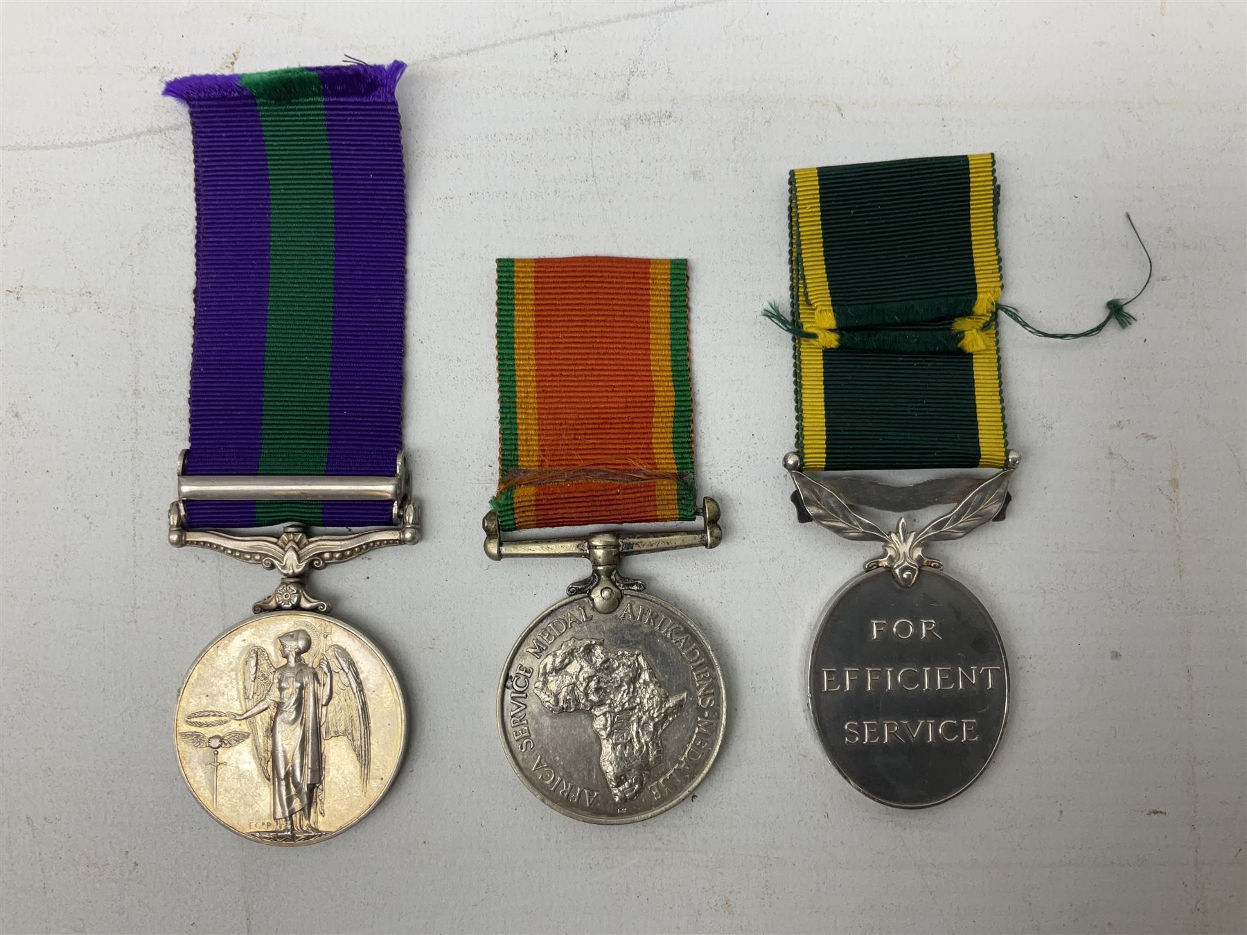 QEII General Service Medal awarded to 23504634 CFN. R.G. Beech REME; Pakistan Independence Medal awarded to Nadir Khan F.C.330; India Independence 50th anniversary medal; and a quantity of WW2 and later medals including Territorial Efficiency Medal awarded to 6196646 Gnr. J.G. Oatway R.A. (13)