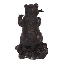 Bronze bear, upon a naturalistic base, with a fish in mouth, H17cm
