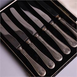 Pair of silver cruets, of baluster form and upon four pad feet, hallmarked Laurence R Watson & Co, Birmingham 1993, together with a set of six silver handled tea knives, hallmarked Barker Brothers Silver Ltd, Sheffield 1955, both in fitted cases