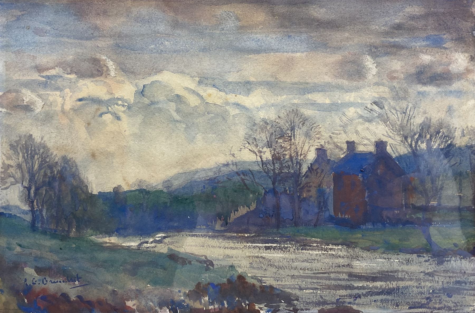 Reginald Grange Brundrit RA ROI (British 1883-1960): View of a House from the Riverbank, watercolour signed 22cm x 33cm 