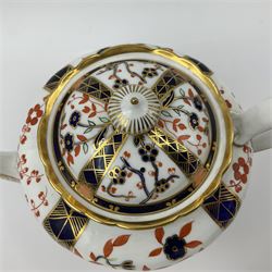 Early 20th century Royal Crown Derby teapot, decorated in a variant of the Imari pattern with blue and red prunus blossoms, with printed mark beneath including illustration date code for 1927, H14cm
