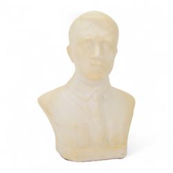 Composite cast bust of Hitler, together Third Reich Nazi German style desk stand depicting the national eagle and swastika on a black stone base, together with two other figures, bust H17cm 