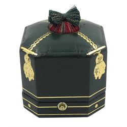 Elizabeth Gage 18ct gold tourmaline and diamond tapered Templar ring, the carved oval pink tourmaline cabochon with a round brilliant cut diamond set either side, the band featuring green guilloche enamel and the edges finished with wire-twist-wire decoration, London 1994, in original box