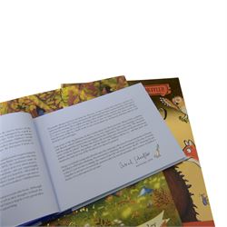 Julia Donaldson and Axel Scheffler books, comprising eleven first editions and four signed copies, including Jonty Gentoo double signed, together with two signed Julia Donaldson book plates and a signed newspaper cutting and one signed Axel Scheffler book plate