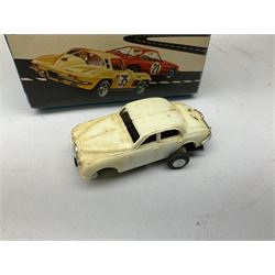 Various makers - Tri-ang Mini-Hi-Way Racing Car Series Le Mans No.9 racing car; Matchbox K-15 Merryweather Fire-Engine; Marx tin-plate Friction Helicopter; all boxed; and a Minic Motor Rally Adventure box containing a Jaguar Police car for spares or repair (4)