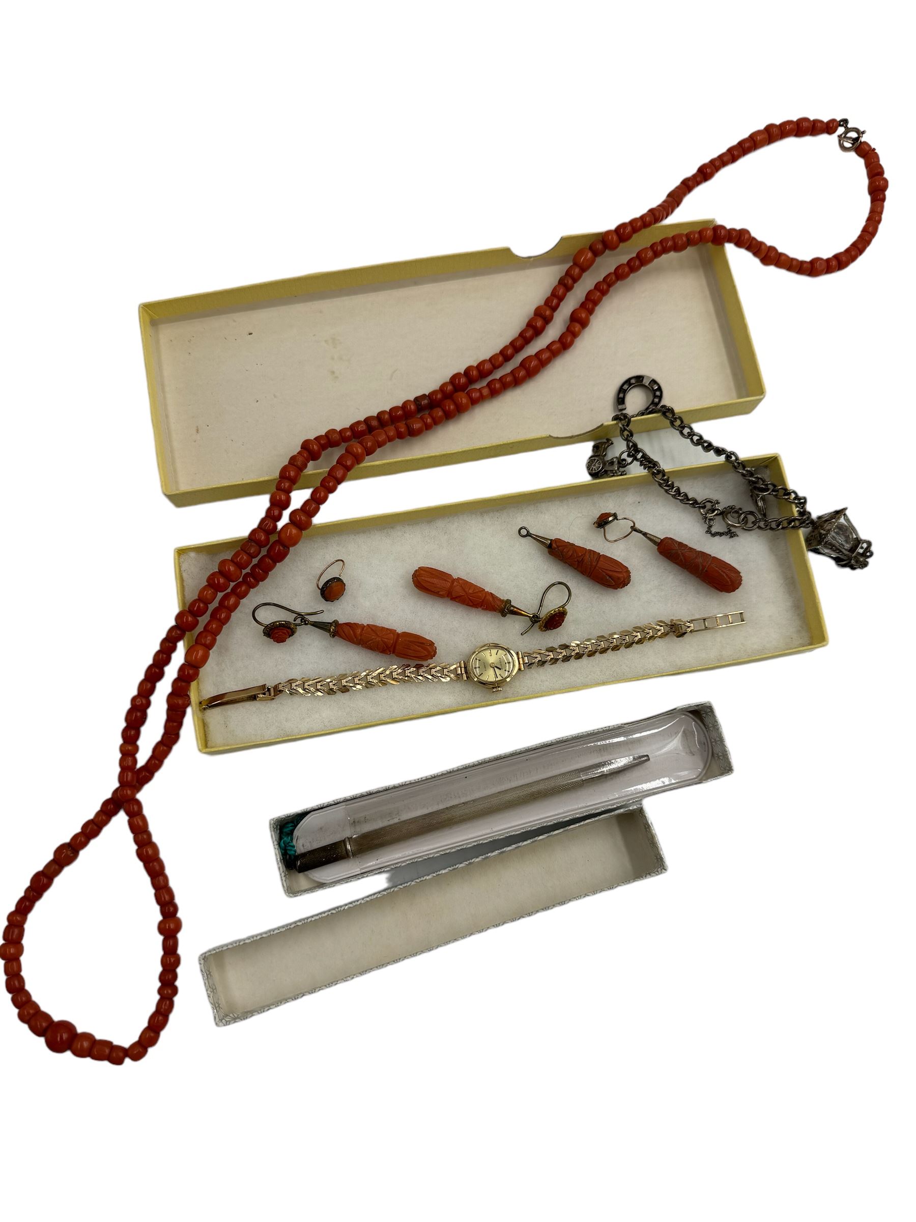 Coral bead necklace and two pairs of carved coral earrings, together with a 9ct gold ladies wristwatch with 9ct gold strap, silver bracelet and a silver pencil