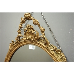  19th century oval mirror, gesso frame with ribbon tied cresting, W58cm, H90cm  