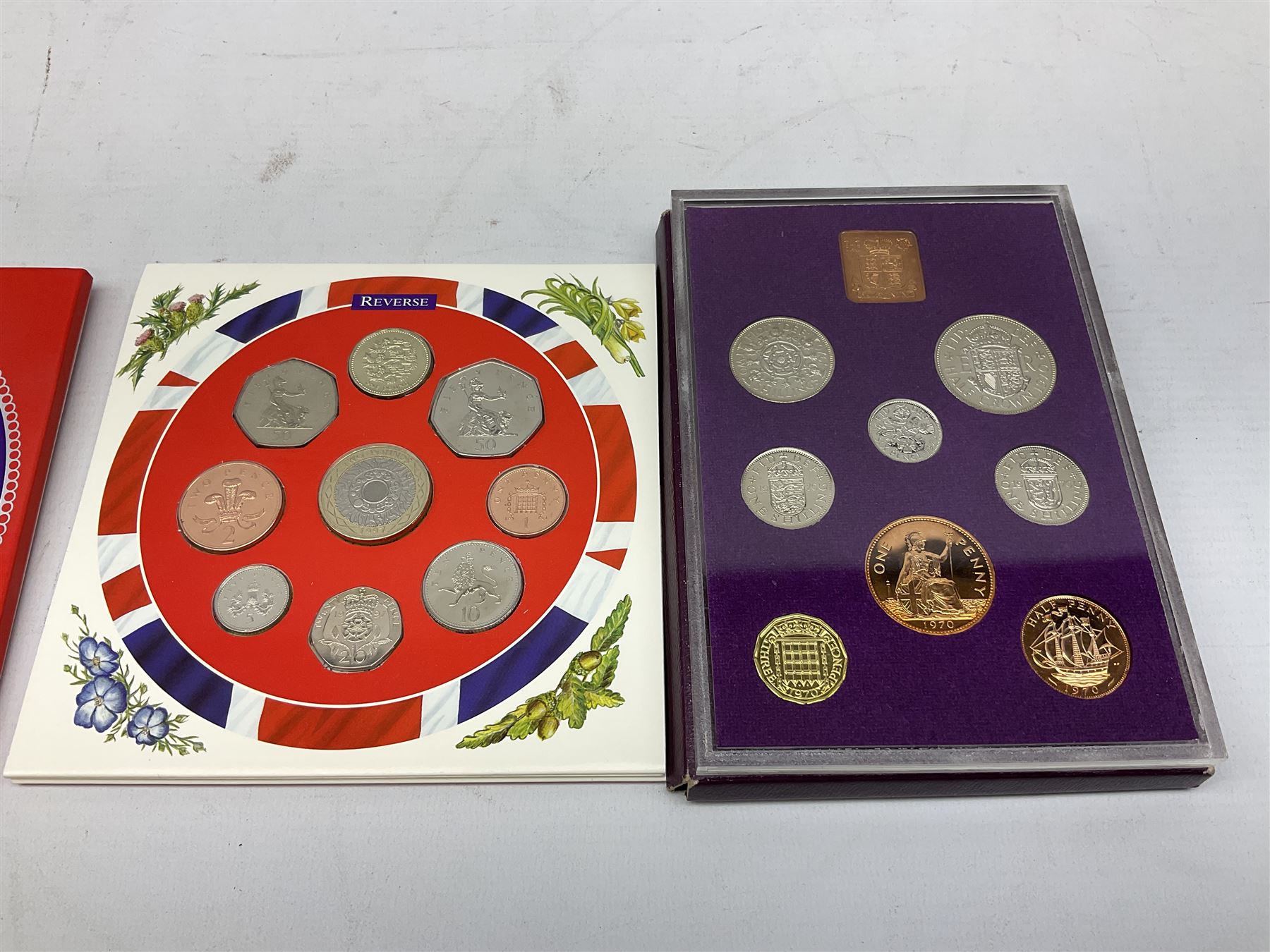Coins including coinage of Great Britain 1970 proof set, United Kingdom 1997 brilliant uncirculated coin collection, various unofficial sets in plastic displays, three Isle of Man commemorative Harry Potter crown coins, United States of America 1982 silver half dollar, pre-decimal and other Great British and World coins etc 