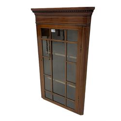 Edwardian mahogany wall hanging corner display cabinet, projecting dentil cornice over astragal glazed door (W56cm, H93cm), and an Edwardian mahogany nest of three tables (46cm x 36cm, H60cm)