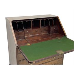 Georgian red walnut and mahogany bureau, moulded rectangular fall front with rounded upper corners, the interior fitted with sliding storage well, a combination of small drawers and pigeons holes, two short and two long drawers below, on bracket feet