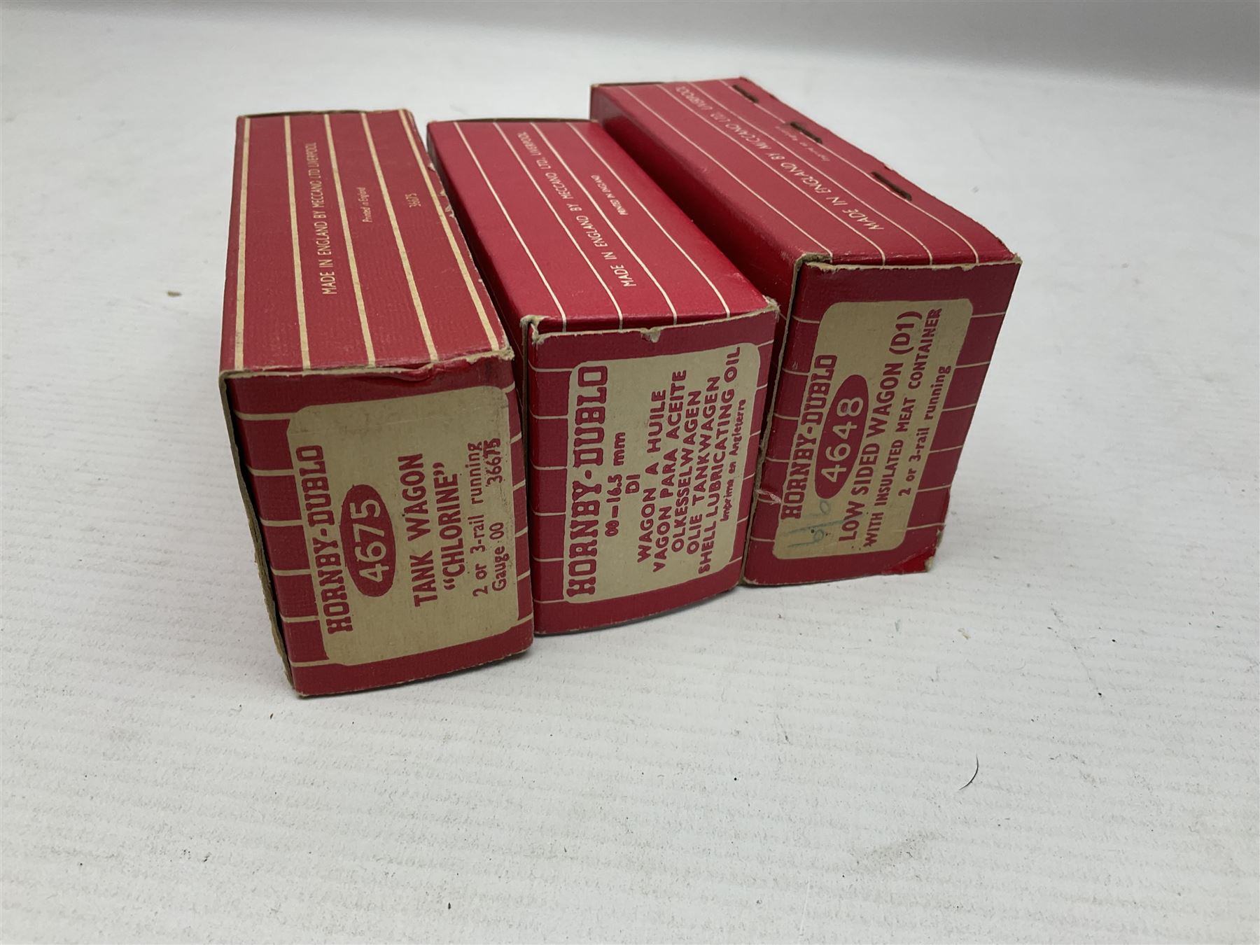 Hornby Dublo - sixteen goods wagons comprising 4644 21-Ton Hopper Wagon, 4315 Horse Box (BR) with horse, 4316 Horse Box (SR) with horse, 4649 Low Sided Wagon with tractor, 4301, 4310, 4311, 4312, 4313, 4320, 4626, 4648, 4652, 4675, 4678 and B550200 (Mineral Wagon); all in red boxes (16)