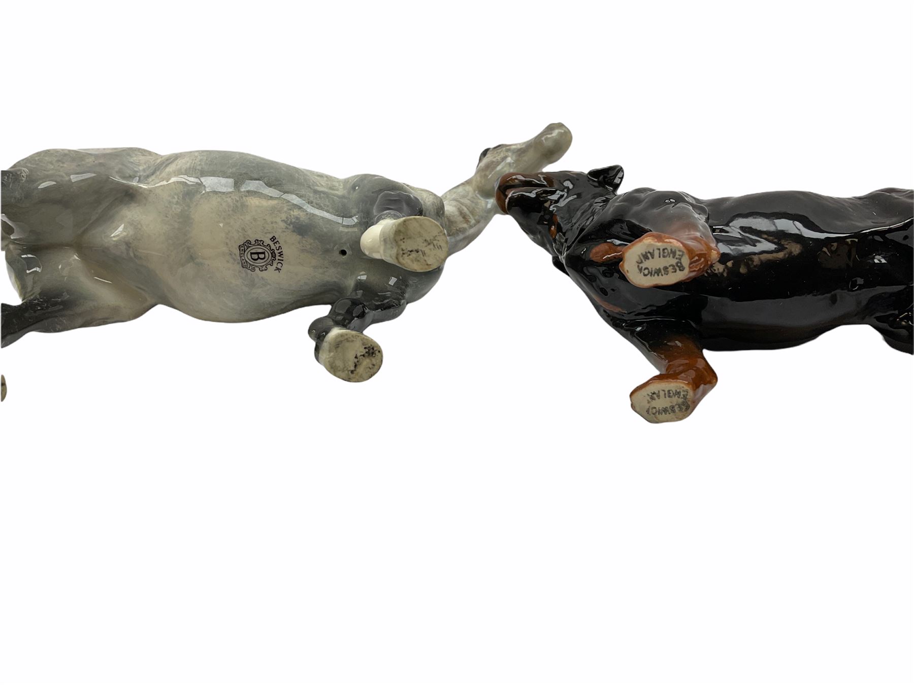 Beswick figures, comprising Afghan Hound 2285, St Bernard 'Corna Garth Stroller' 2221, Rottweiler 3056, Greatdane 'CH Ruler of Ouborough', Fox, Elephant, and dappled grey type horse. 