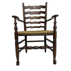Set eight (6+2) oak dining chairs, high waived ladder back over rush seats, raised on ring turned supports with pad front feet, united by stretchers