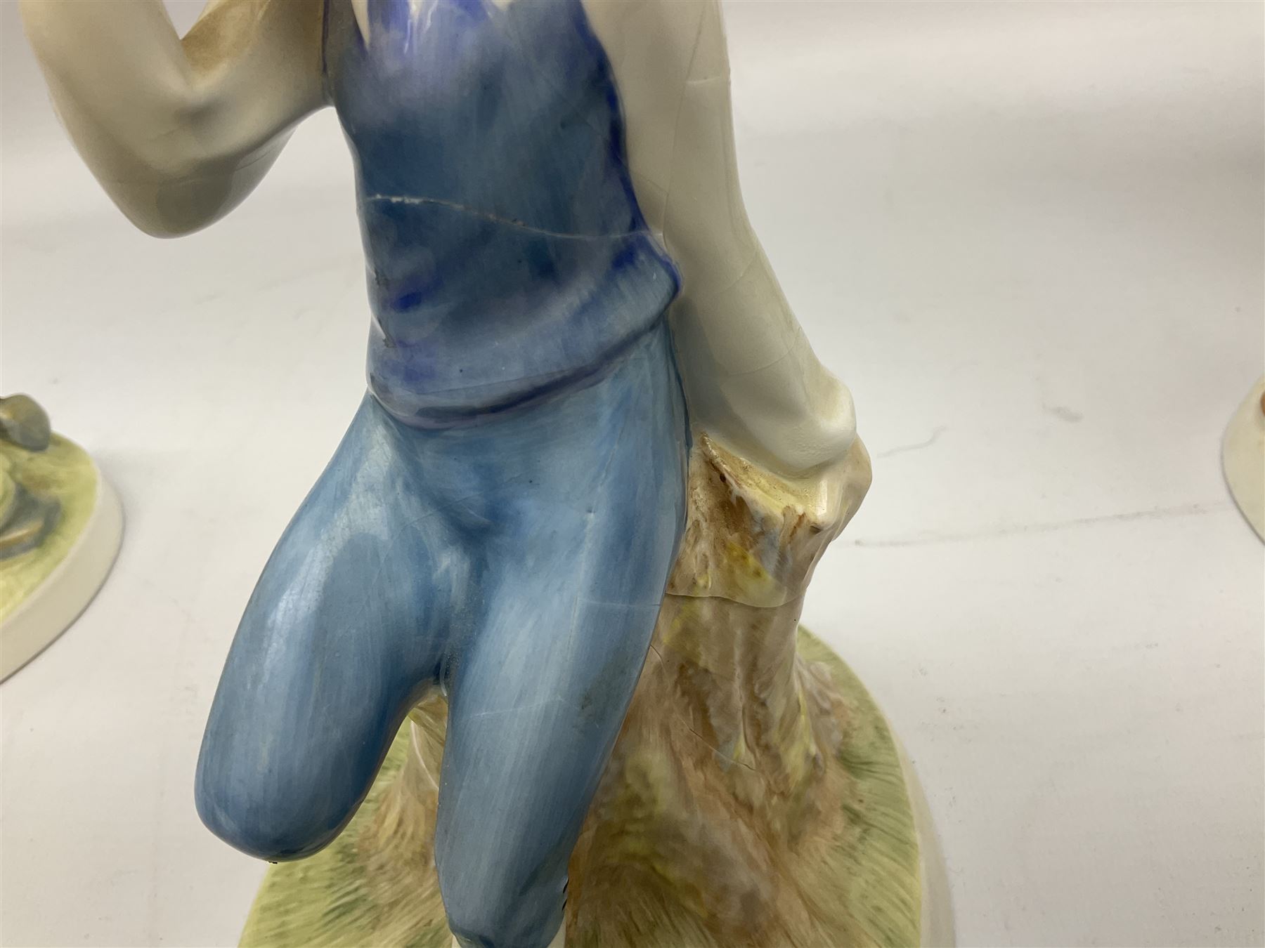 Seven Royal Doulton figures from the Nursery Rhymes Collection comprising, Tom Tom, the piper's son HN3032, Little Jack Horner HN3034, Wee Willie Winkie HN3031, Polly, put the kettle on HN3021, Little Bo-peep HN3030, Little Boy Blue HN3035, Little Miss Muffet HN2727, together with two Royal Doulton Mary had a little lamb figures HN2048 and COPR1948, all with printed marks beneath  