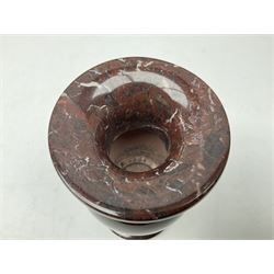 Red marble vase, of baluster form upon a stepped foot, H20cm 