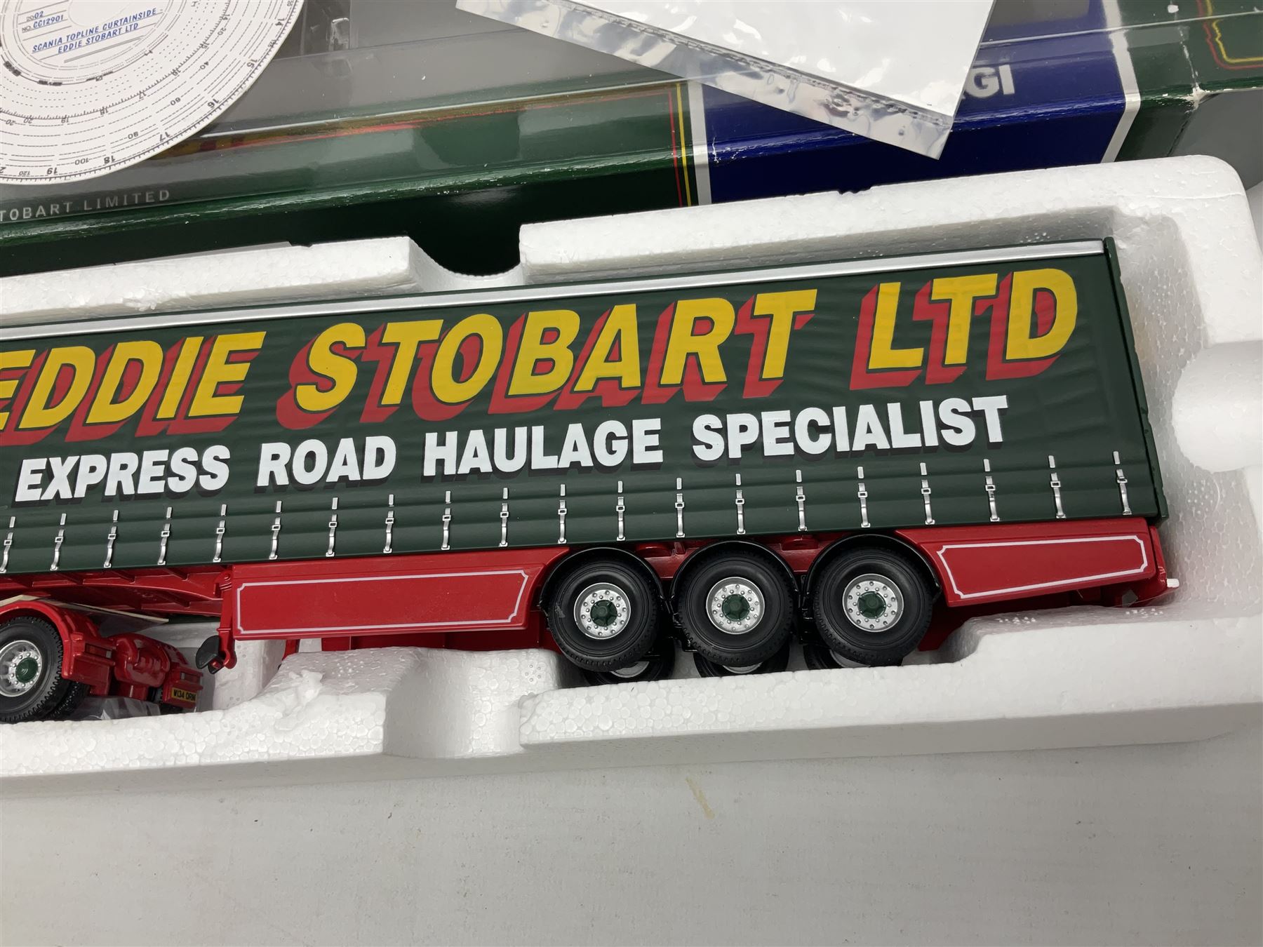 Corgi - three limited edition lorries comprising CC12901 Scania Topline Curtainside Eddie Stobart Limited; CC12104 Renault Premium Curtainside Strongserve Ltd; and 50703 Guinness Mack LJ with Fruehauf Trailer; all boxed (3)
