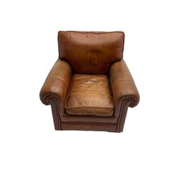 Large two seat sofa upholstered in tan 'Derwent' leather (W200cm D100cm H85cm), and matching armchair (W95cm)