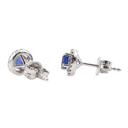 Pair of 18ct white gold sapphire and diamond circular stud earrings, total sapphire weight approx 0.60 carat