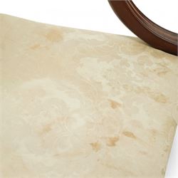 Georgian design mahogany framed Gainsborough armchair, arched cresting rail over shaped arms on curved and moulded supports, upholstered in pale green fabric with repeating foliate pattern, on square tapering moulded supports united by plain stretchers 