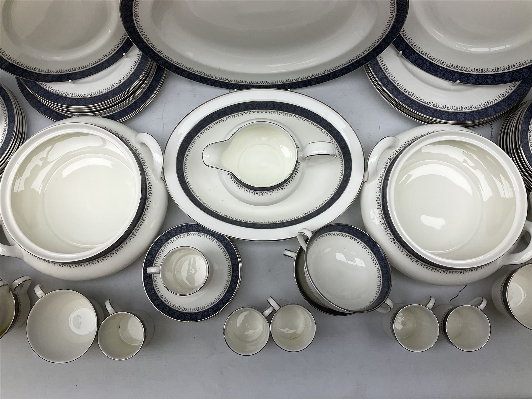 Royal Doulton tea and dinner wares decorated in the 'Sherbrooke' pattern,.to include two lidded