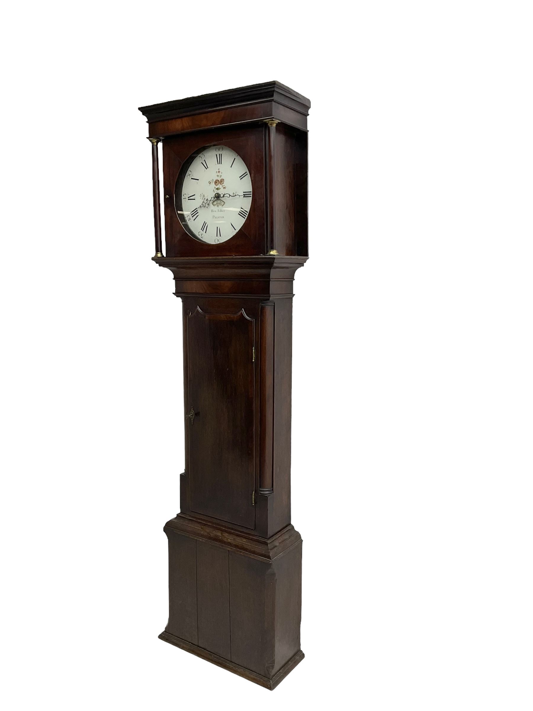 Henry Fisher of Preston (Lancs) -  late 18th century 30-hour oak and mahogany longcase clock c1790, with a flat topped pediment and moulded cornice, square hood door flanked by two plain pillars with brass capitals, trunk with recessed quarter columns, three-quarter length trunk door with an ogee twin spire top and crossbanding, rectangular plinth with canted corners and a narrow applied moulding to the base, circular 13” painted dial with Roman numerals, minute markers and five minute Arabic's, floral decoration to the centre and a semi-circular calendar aperture with date disc behind, original steel serpentine hands, dial inscribed “H Fisher, Preston”, dial pinned directly to a weight driven countwheel striking movement, striking the hours on a cast bell. With pendulum and weight.
Henry Fisher is recorded as working in Preston from 1742-95.
