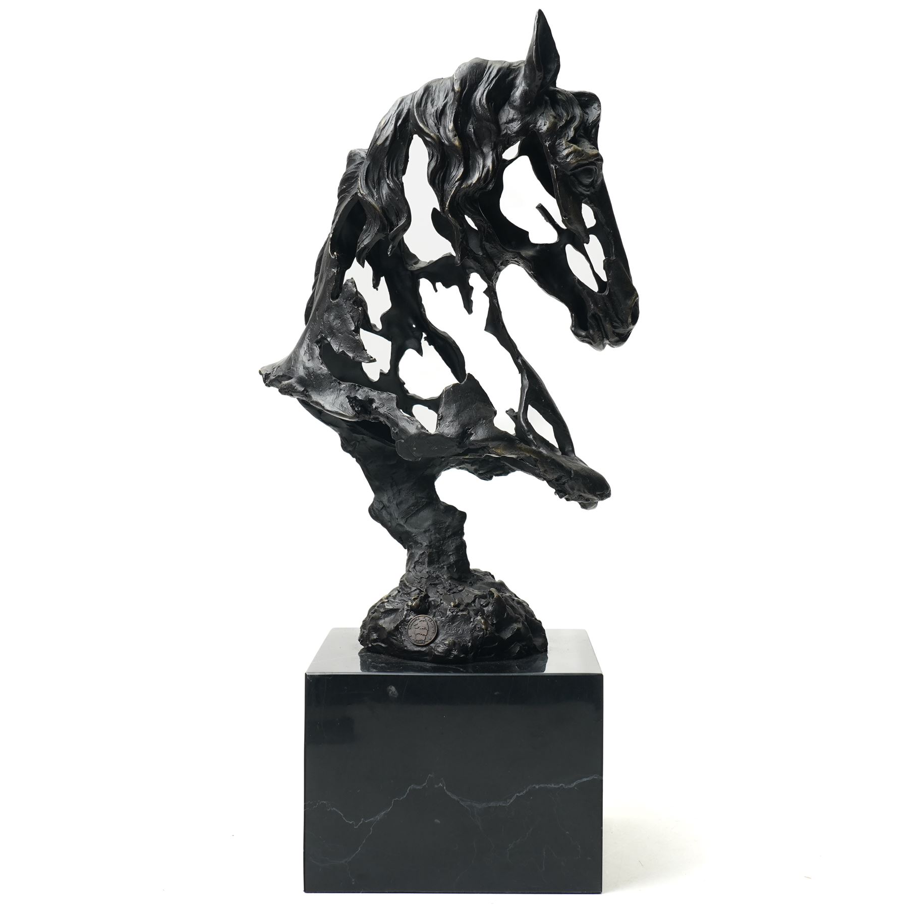 Stylised horse head, bronze, signed Gadi and bearing foundry mark, upon black stone square plinth, overall H41cm