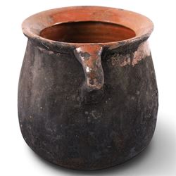Spanish twin handled cooking pot, blackened to the outside, together with two bowls with slipware glaze, pot H22cm 