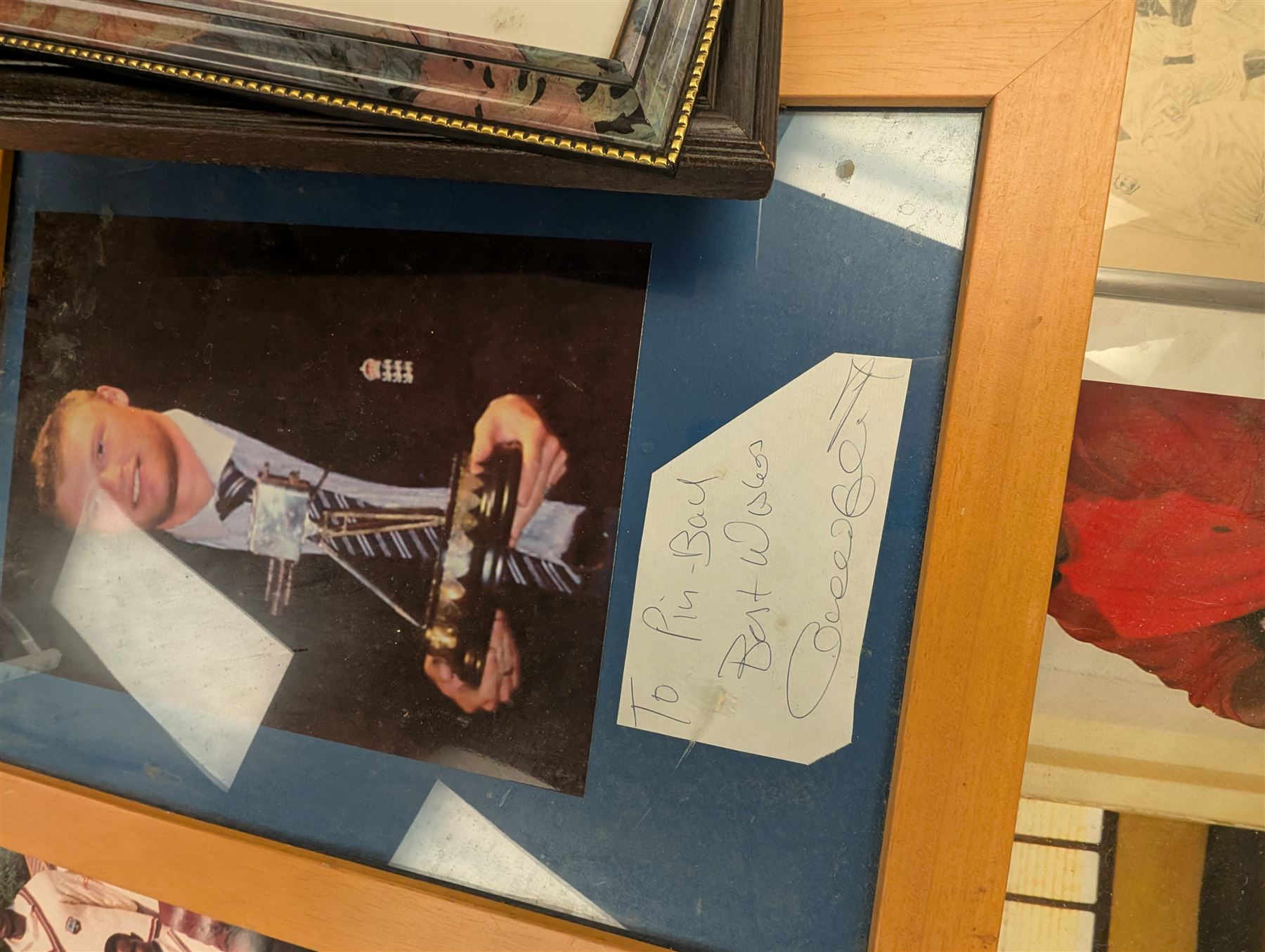 Collection of signed International cricket memorabilia, mostly relating to West Indies, including Curtly Ambrose and Brian Lara prints, Shane Warne and Glen McGrath last test souvenirs, signed Zimbabwe 2003 tour cricket bat, etc
