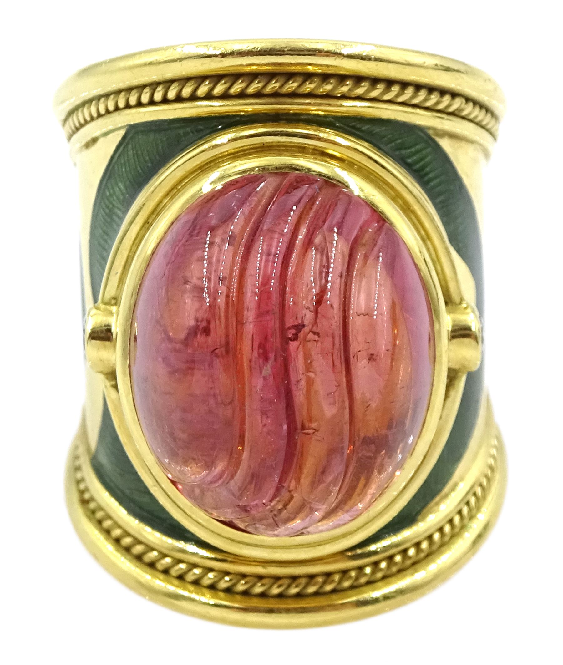 Elizabeth Gage 18ct gold tourmaline and diamond tapered Templar ring, the carved oval pink tourmaline cabochon with a round brilliant cut diamond set either side, the band featuring green guilloche enamel and the edges finished with wire-twist-wire decoration, London 1994, in original box