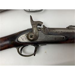 19th century Indian .577 Enfield muzzle loading rifle, proofed for 26-bore, the 98.5cm barrel with three barrel bands and later ram rod L140cm overall; 19th century Belgian side-by-side double barrel percussion shotgun, approximately 20-bore, with 74cm barrels and studded walnut stock, lock plate marked 'Liege 1868' and 'V. Gulikers-Maquinay' L117cm overall; and another side-by-side double barrel shotgun by Smythe with underlever opening (3)