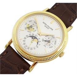 Patek Philippe 18ct gold perpetual calendar automatic wristwatch, Ref. 5039J, Cal. 240 Q, Movement 27 jewels, No. 775255, silvered dial with moon phases, 24 hour and leap year indication, with Patek Philippe Certificate of Origin, purchased 24 April 1997, service history, on Patek brown leather strap with 18ct gold buckle and additional black leather strap