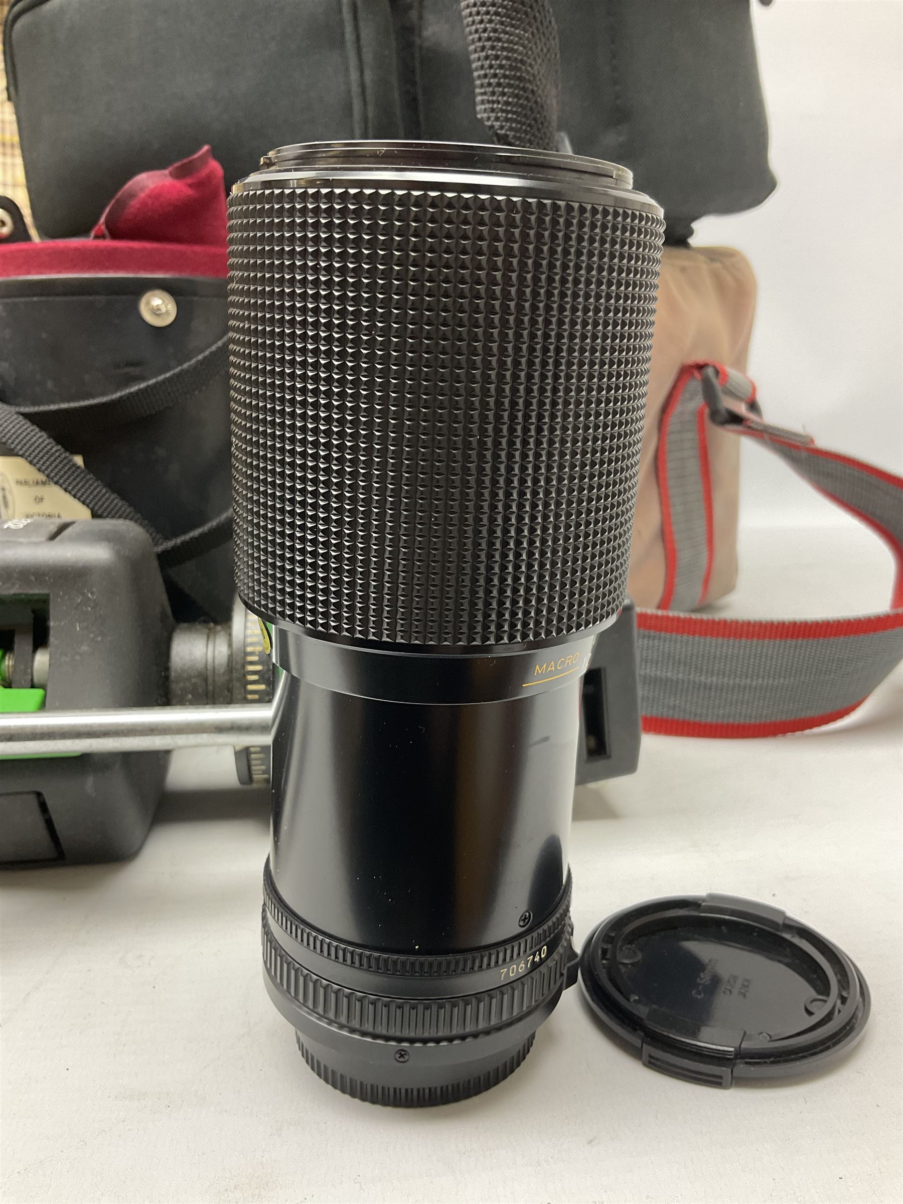Canon T50 camera body, together with lenses and other camera equipment, projector etc