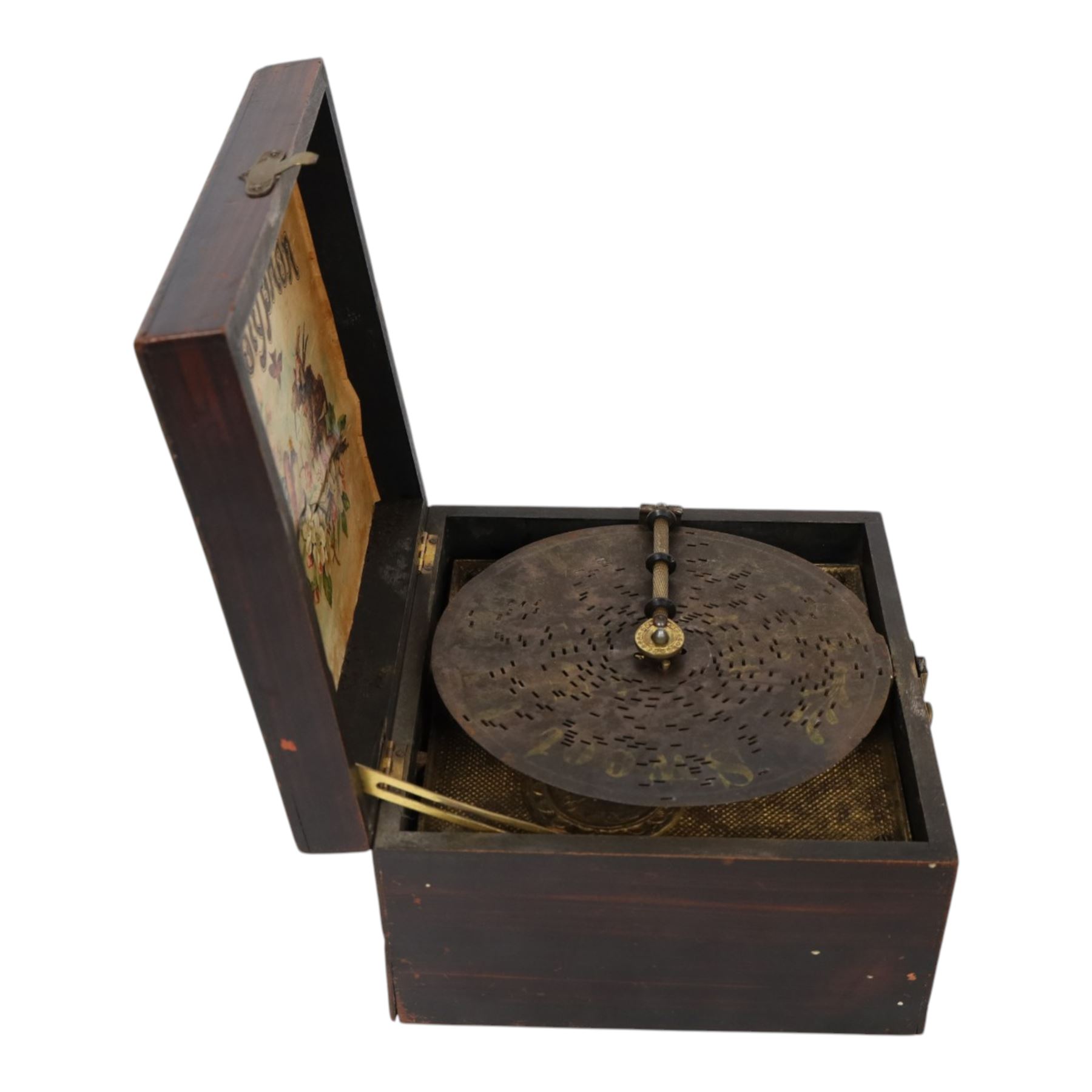German late 19th century Polyphon, in a mahogany finished case with floral decoration to cover, serial no. 17707, with thirteen discs, H12.5cm, W20cm