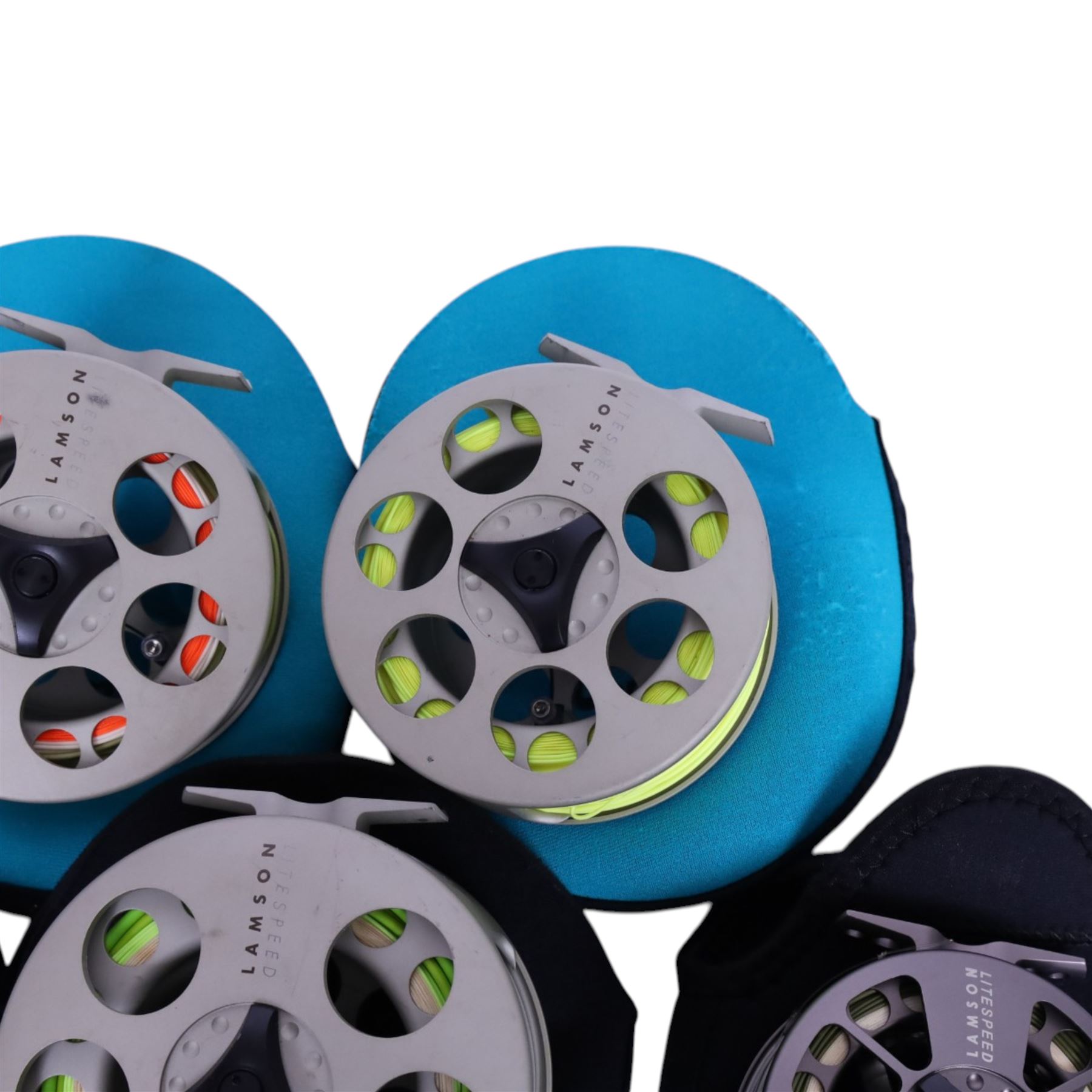 Five Lamson Litespeed fly reels, comprising LS4, two LS2, two LS3.5, all within Lamson soft pouches