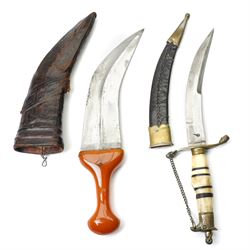 Arab jambiya with simulated amber handle and leather sheath, African dagger with horn handle and a copper shot flask (3) 