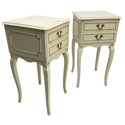 Pair of French classic design cream painted bedside tables, fitted with two drawers, on cabriole supports (W35cm D34cm H69cm); with matching headboard, decorated with moulded flower heads and bell-flower festoons (W233cm H61cm)