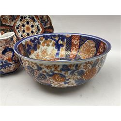 Two Japanese Imari bowls, together with Imari dish with scalloped edge and jug, largest bowl, H12cm