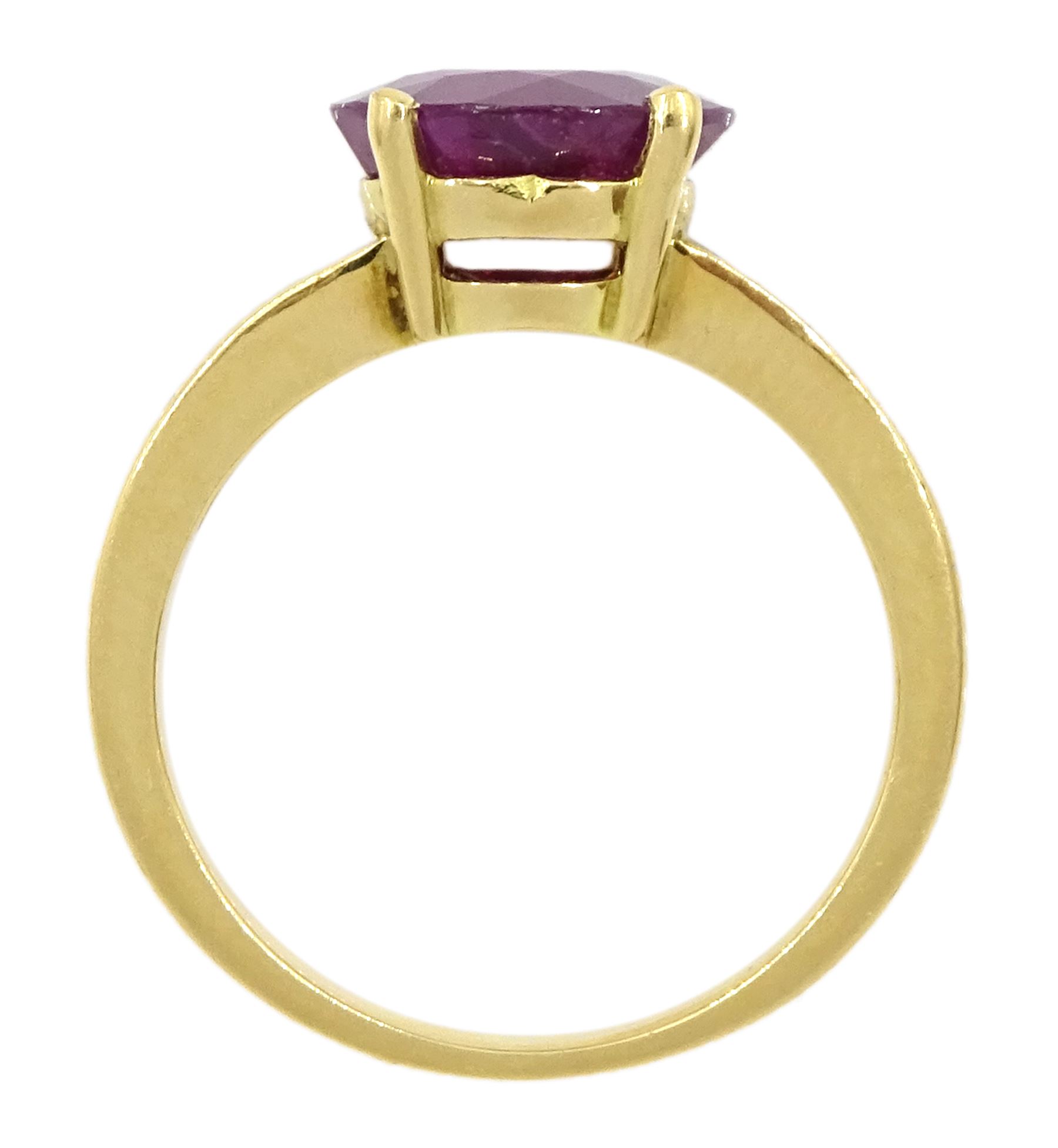 18ct gold ruby and diamond ring, single round cut ruby of approx 3.25 carat, with channel set baguette cut diamond shoulders, total diamond weight approx 0.85 carat