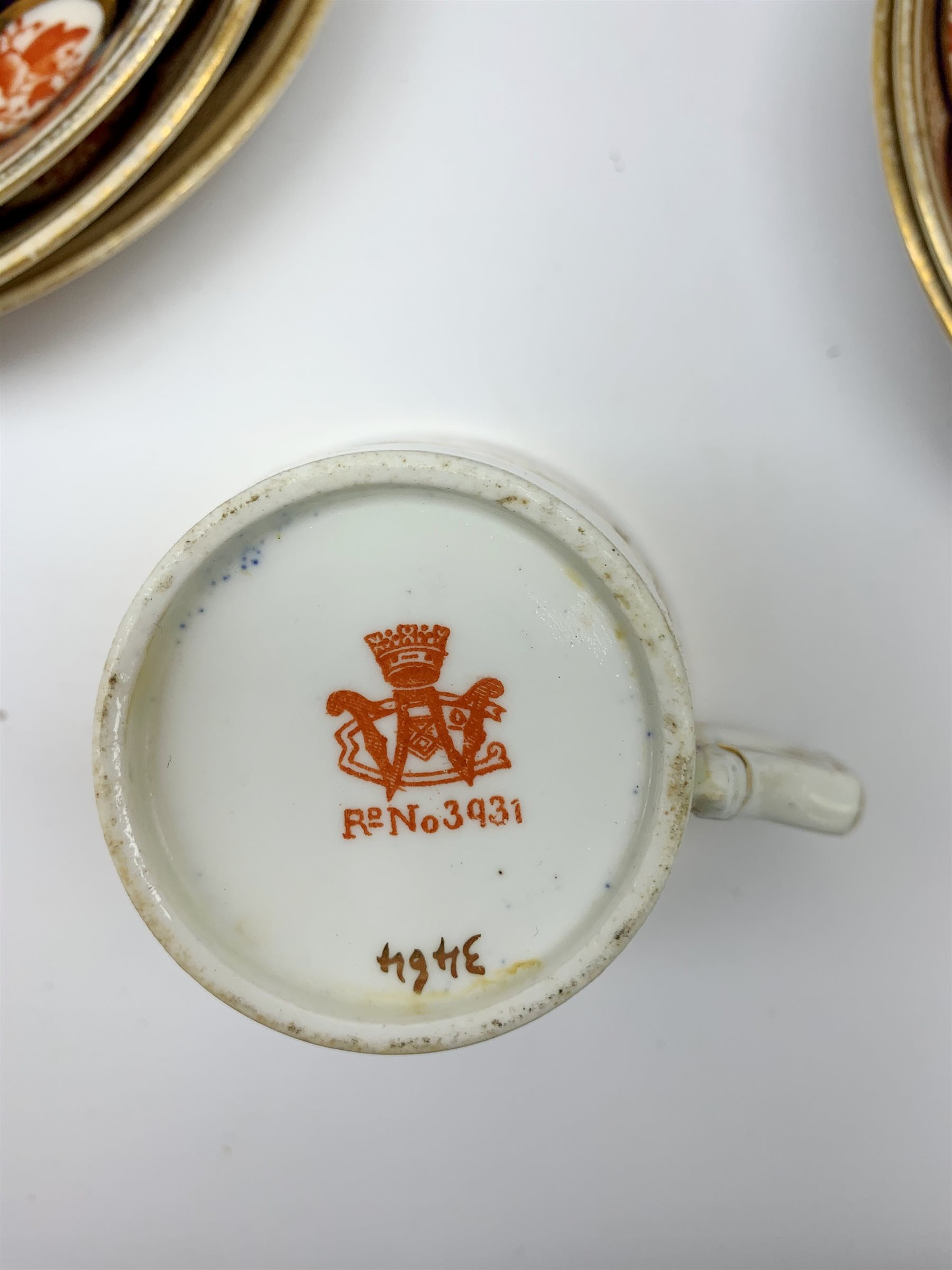 Wileman & Co (Foley) teawares, in the 'Japan' Imari pattern, no 3464, comprising six coffee cans and twelve saucers, eleven side plates, one moustache cup and one saucer, two cake plates, milk jug, and slop bowl. 
