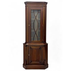 Late 20th century mahogany corner cabinet, dentil moulded cornice above a glazed door with...