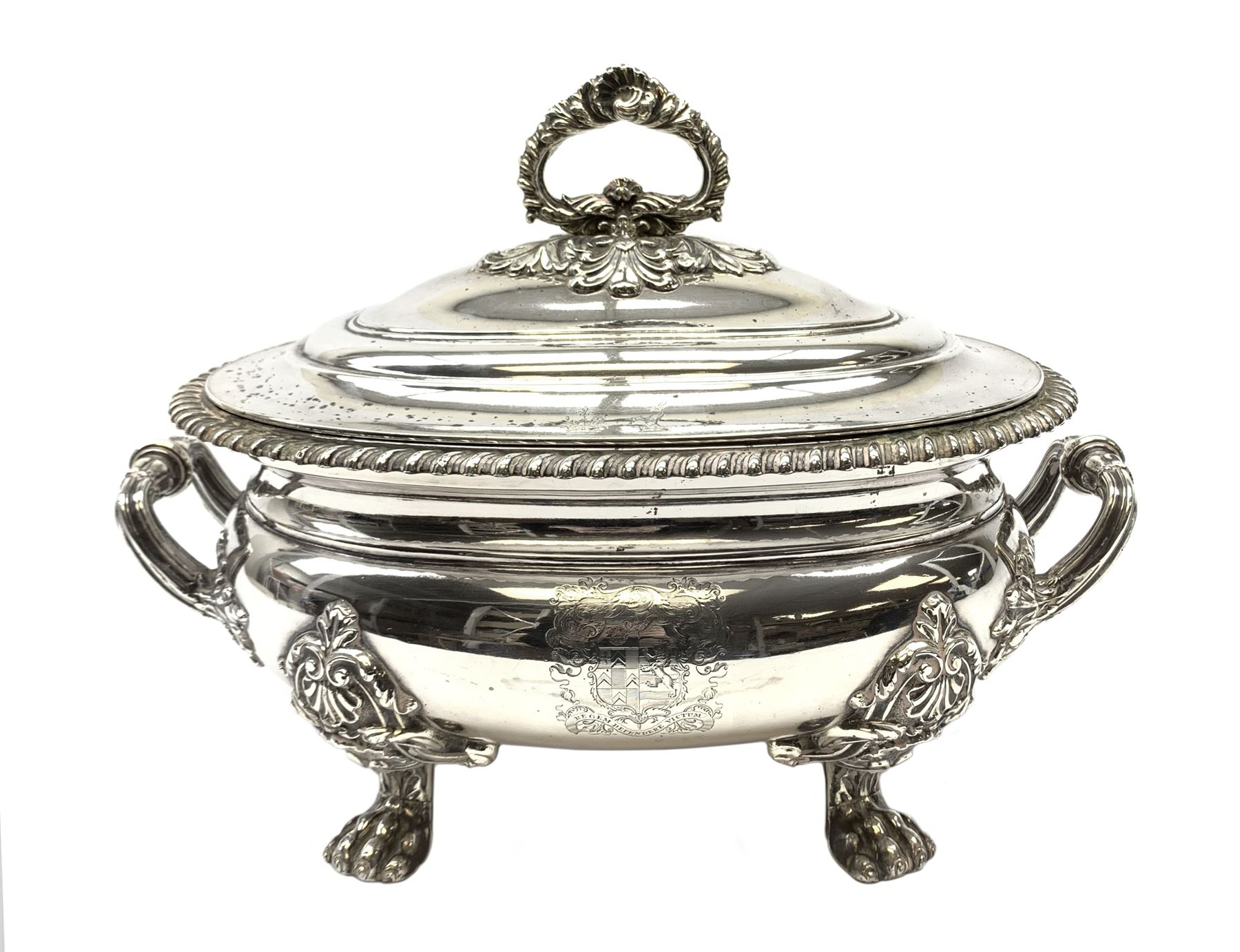Matthew Boulton silver plated tureen and cover, the body of oval form with twin handles engraved with crest, probably for Whitgreave/Whitgrave family of Moseley Staffordshire, 'Regem Defendere Victum', (To defend the king even in his defeat/To defend the conquered king ), upon four paw feet, the cover with gadrooned rim and foliate loop handle 