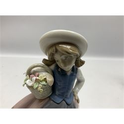 Three Lladro Flower Girls figures, comprising Sweet Scent no 5221, Pretty Pickings no 5222 and Spring is Here no 5223, largest example H18cm 