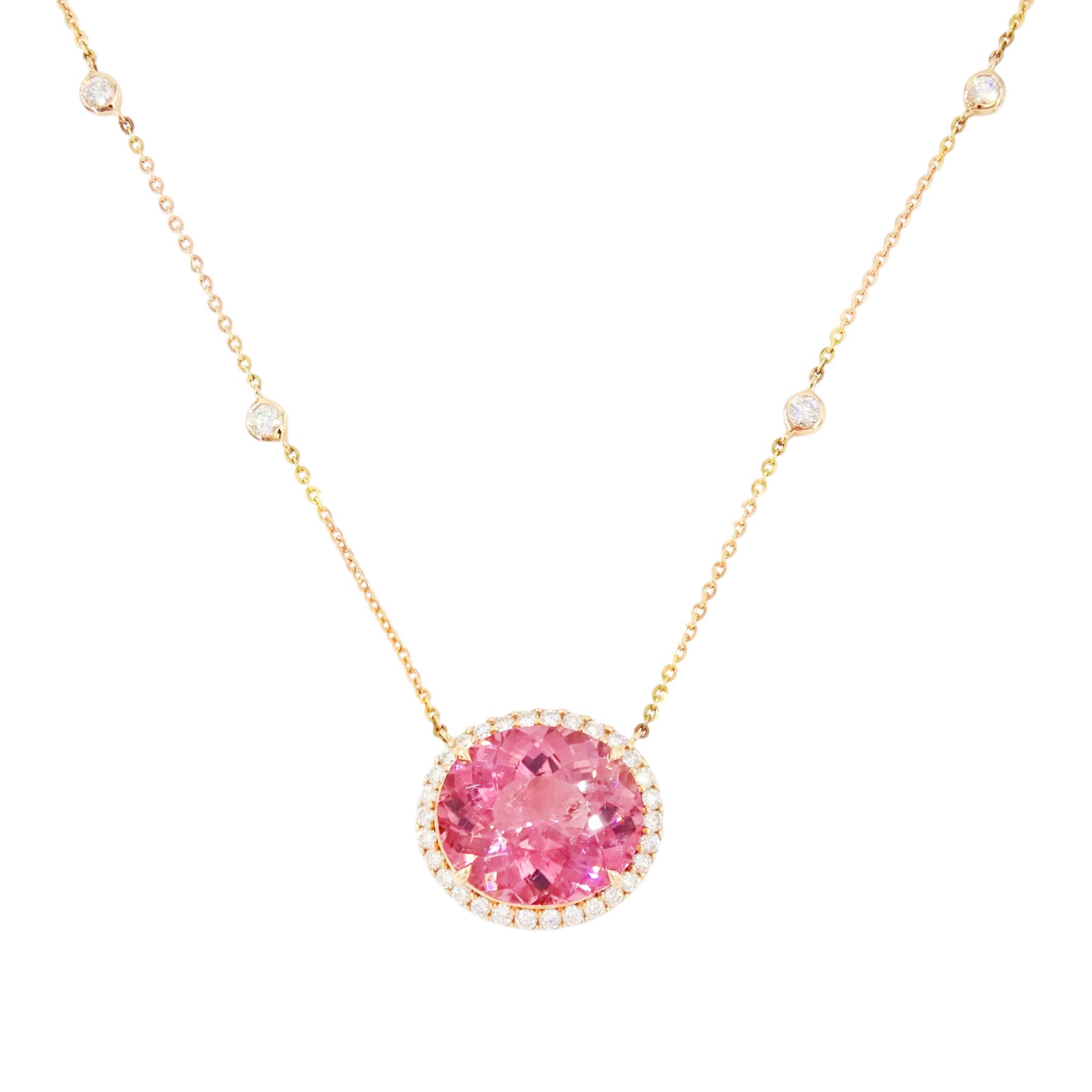 18ct rose gold pink tourmaline and diamond pendant necklace, oval cut tourmaline of 15.41 carat, surrounded by round brilliant cut diamonds, to a trace link chain necklace set with four diamonds, stamped 750, total diamond weight 1.22 carat, with World Gemological Institute report