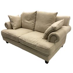 Two seat sofa, upholstered in beige linen fabric