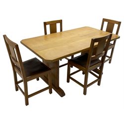 Light oak dining table, rectangular top with canted corners, raised on straight end supports with sledge feet (W152cm D80cm H74cm); and set four oak dining chairs, splat back over brown faux leather seat, on square supports