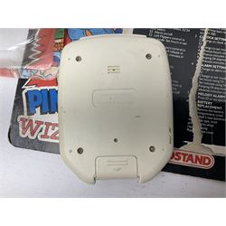 Collection of retro handheld games, including Nintendo Game & Watch ‘Snoopy Tennis’ (1982) and ‘Squish’ (1986) both with instruction booklets, Casio CG-600 ‘Star Invader’ with box, 3 in 1 LCD cartridge game including ‘Soccer’, ‘Invader’ and ‘Bomb Finder’ games, and two Grandstand ‘Pinball Wizard’ (1988) games, both with original boxes