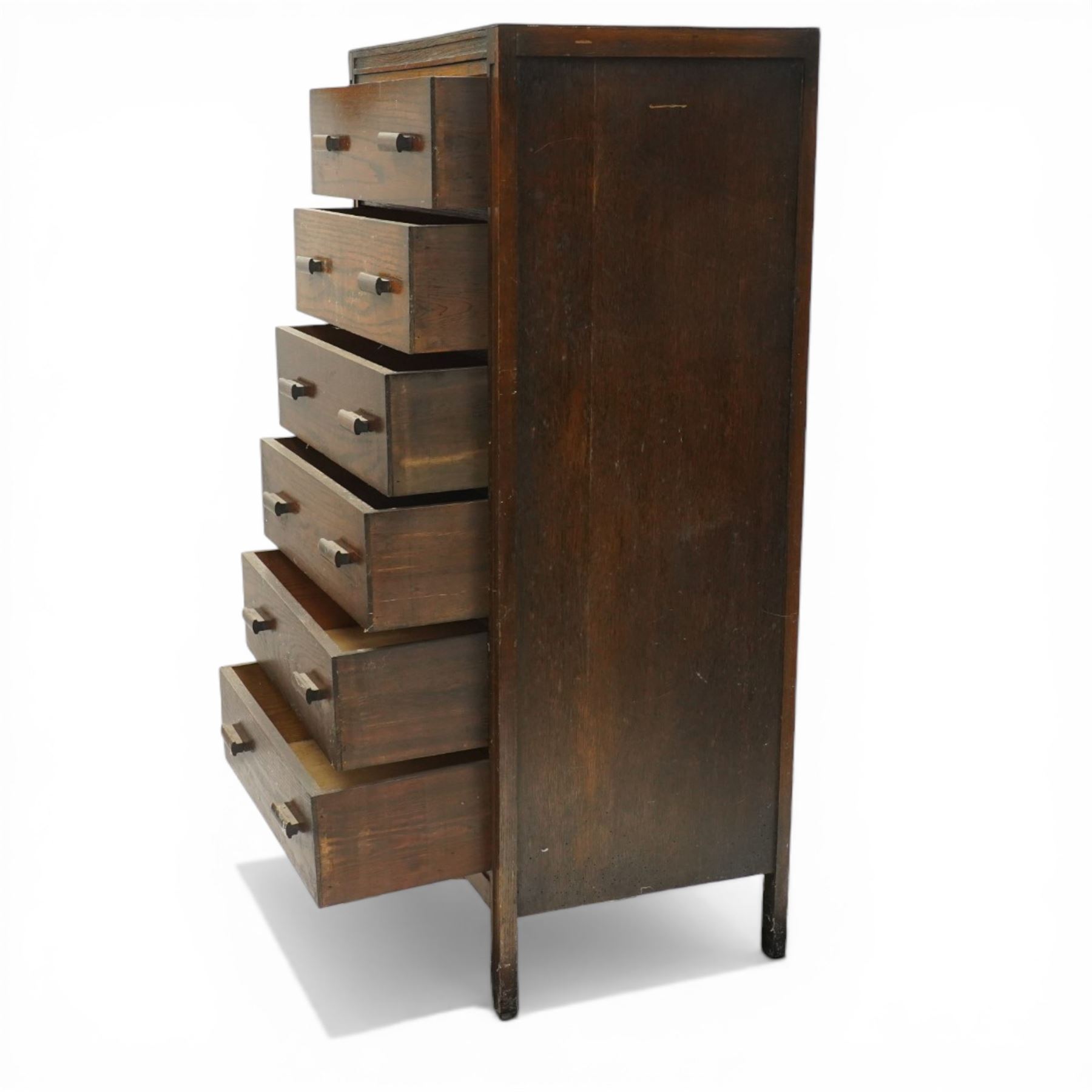 Edwardian tall oak chest fitted with six long drawers, on stile supports