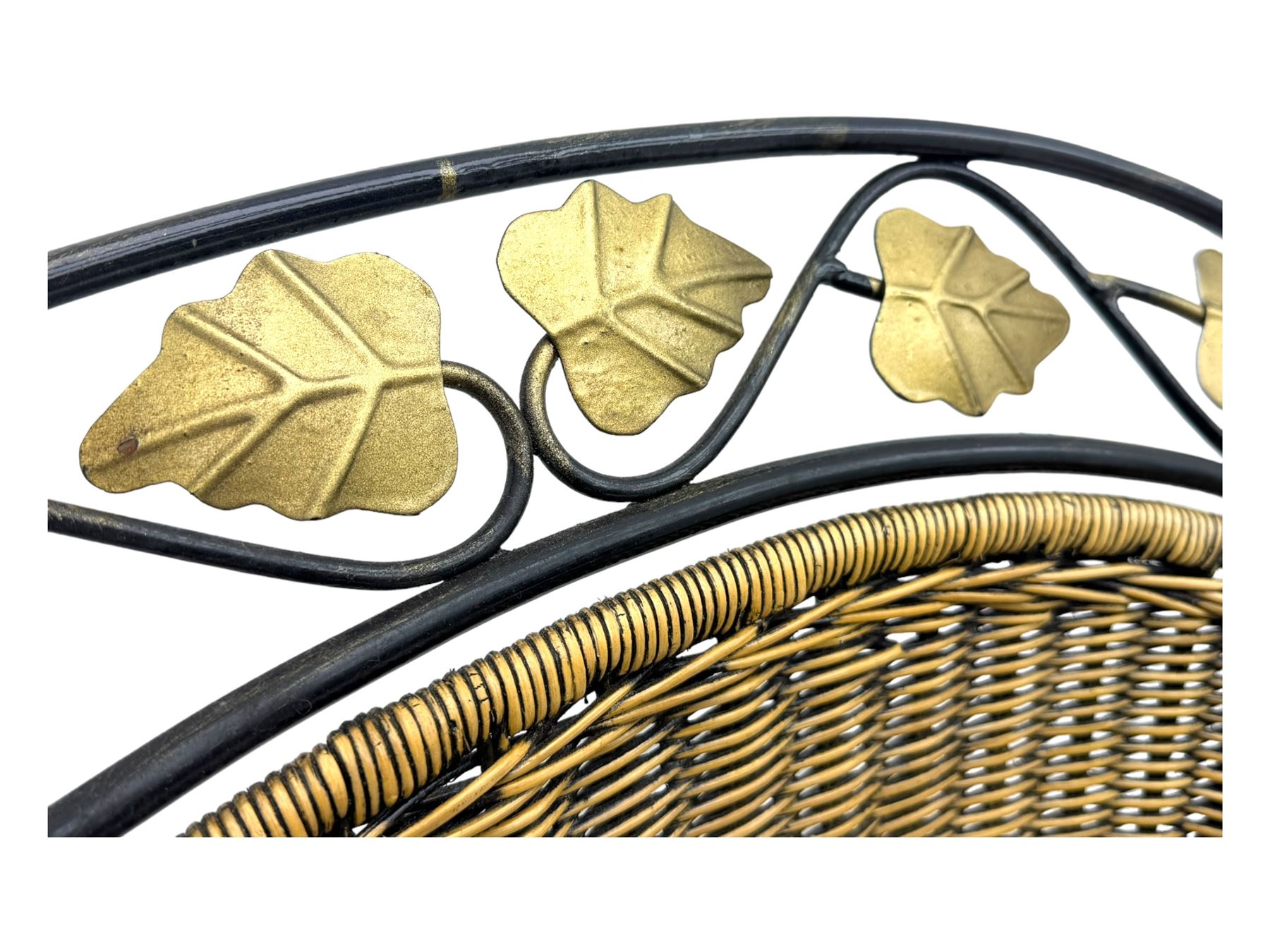 Late 20th century three-piece garden suite, wicker construction and wrought iron frame, decorated with cast metal leaf motifs, cream seat cushions and round back cushions