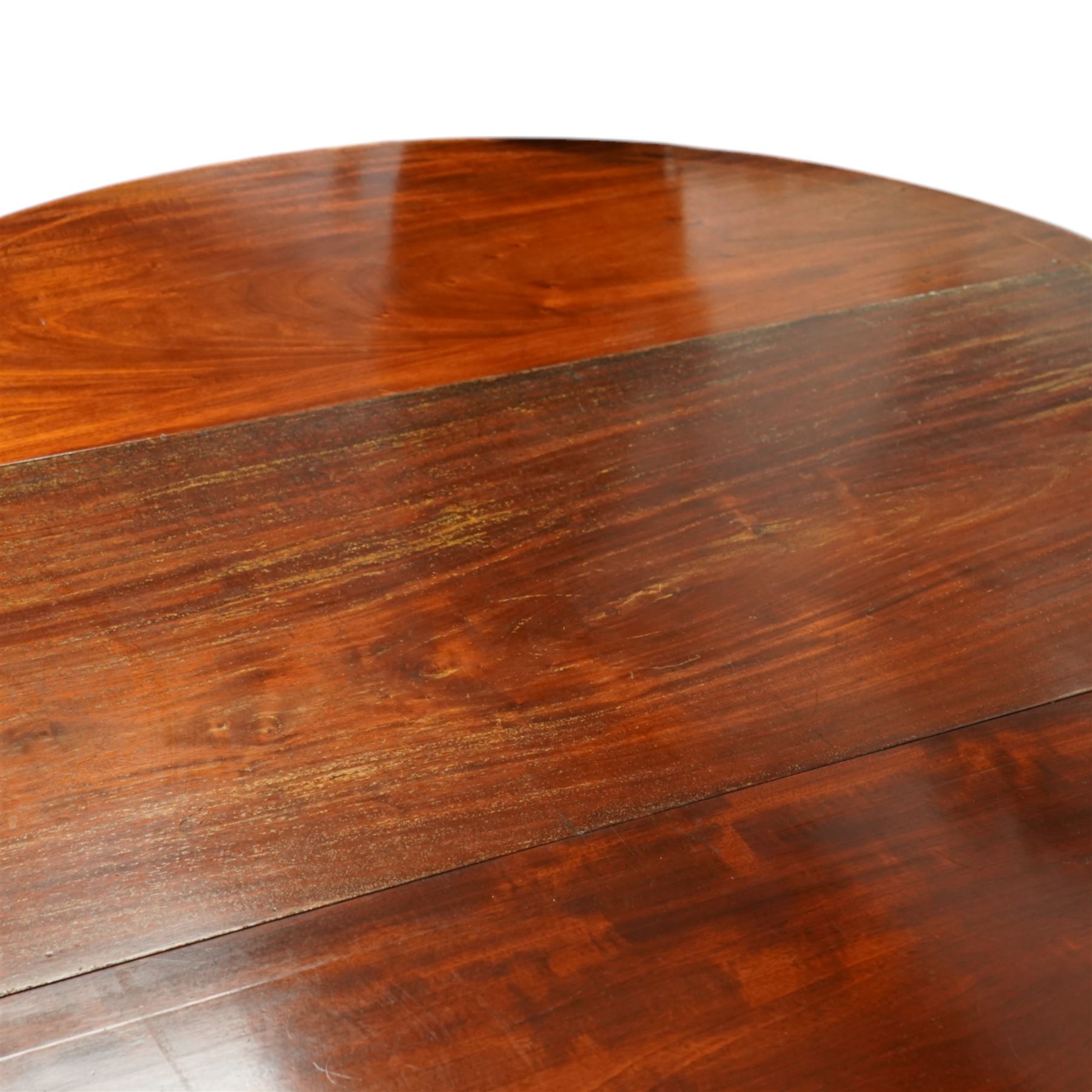 19th century and later mahogany extending dining table (12' 7’'), two D-ends, central drop-leaf table and two additional leaves, with satinwood bands, on square supports with block feet (lacking forks)