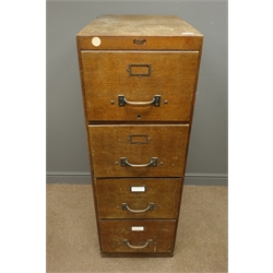  Early 20th century 'Abbess' oak four drawer filing cabinet, brass pull handles, plinth base, W46cm, H132cm, D69cm  